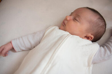 When do babies sleep through the night?